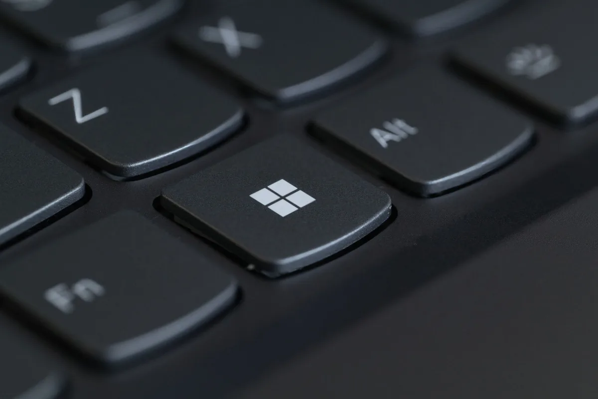 Close-up of a black keyboard showing the Windows key between Alt and Z keys.